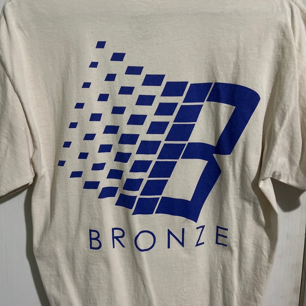 Bronze56k blue on cream B logo tee